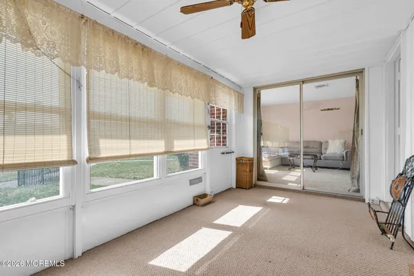 a large white room with a large window
