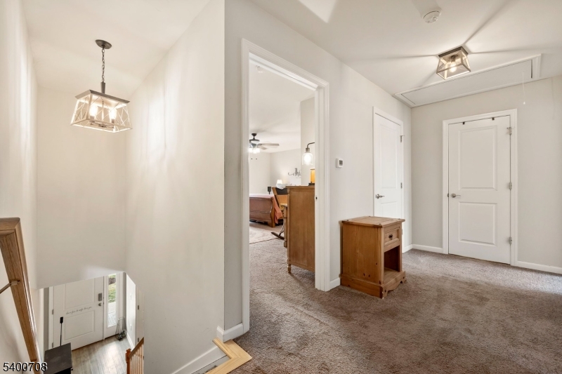 4 Gregg Court Newton, NJ 07860 - Photo 11 of 22 a view of empty room with wooden floor