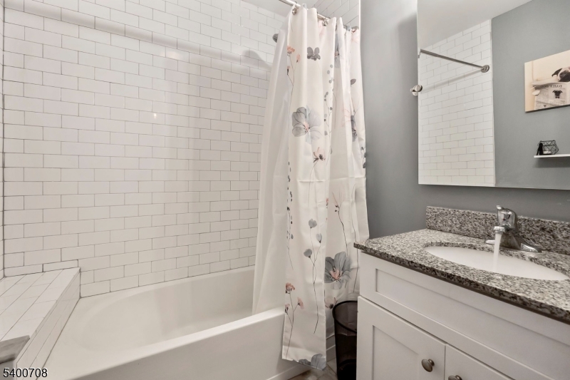 4 Gregg Court Newton, NJ 07860 - Photo 13 of 22 a bathroom with a granite countertop bathtub shower sink vanity and toilet