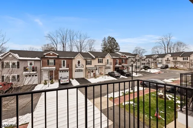 a view of a street from a balcony