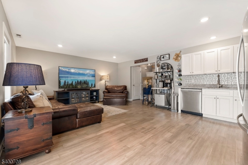 4 Gregg Court Newton, NJ 07860 - Photo 7 of 22 a living room with furniture and a flat screen tv