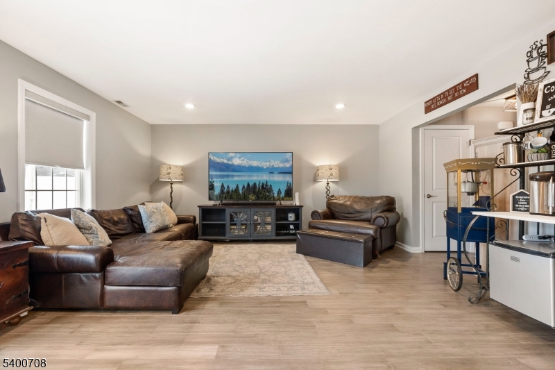 4 Gregg Court Newton, NJ 07860 - Photo 8 of 22 a living room with furniture and a flat screen tv
