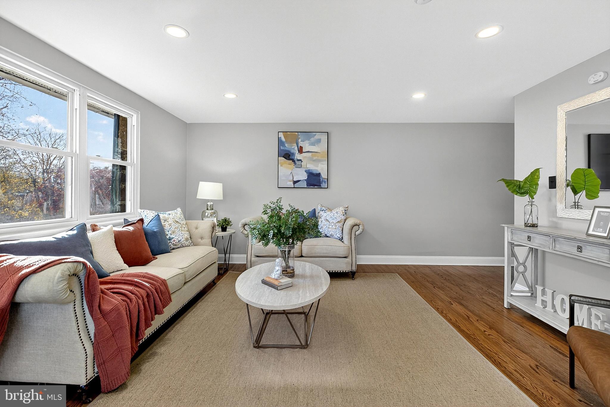 3901 Elson Road Brookhaven, PA 19015 - Photo 11 of 47 a living room with furniture and a potted plant