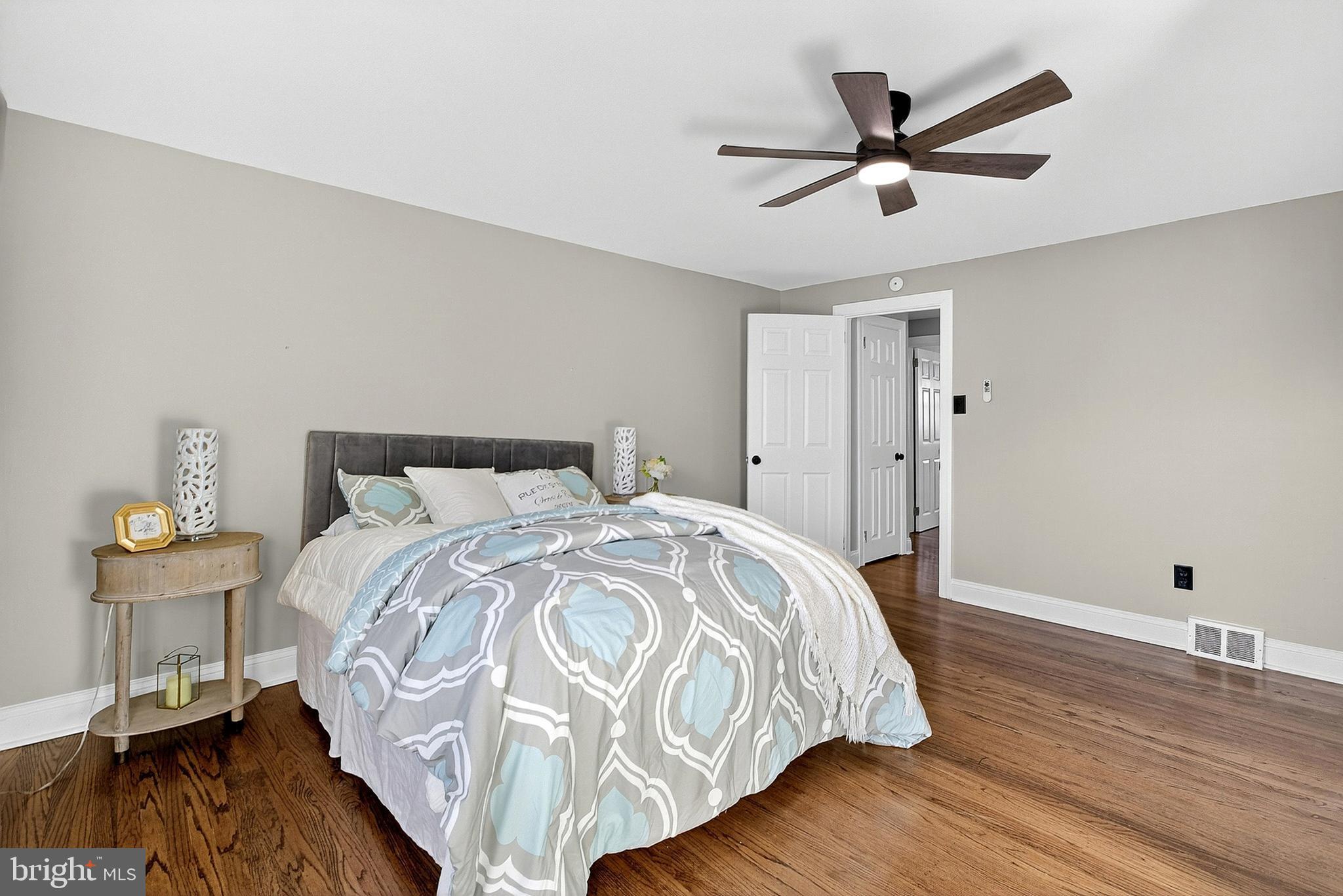 3901 Elson Road Brookhaven, PA 19015 - Photo 22 of 47 a bed room with a bed and a ceiling fan