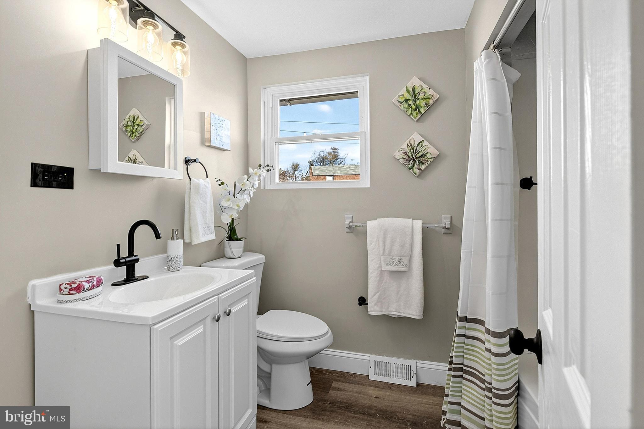 3901 Elson Road Brookhaven, PA 19015 - Photo 25 of 47 a bathroom with a sink toilet and shower