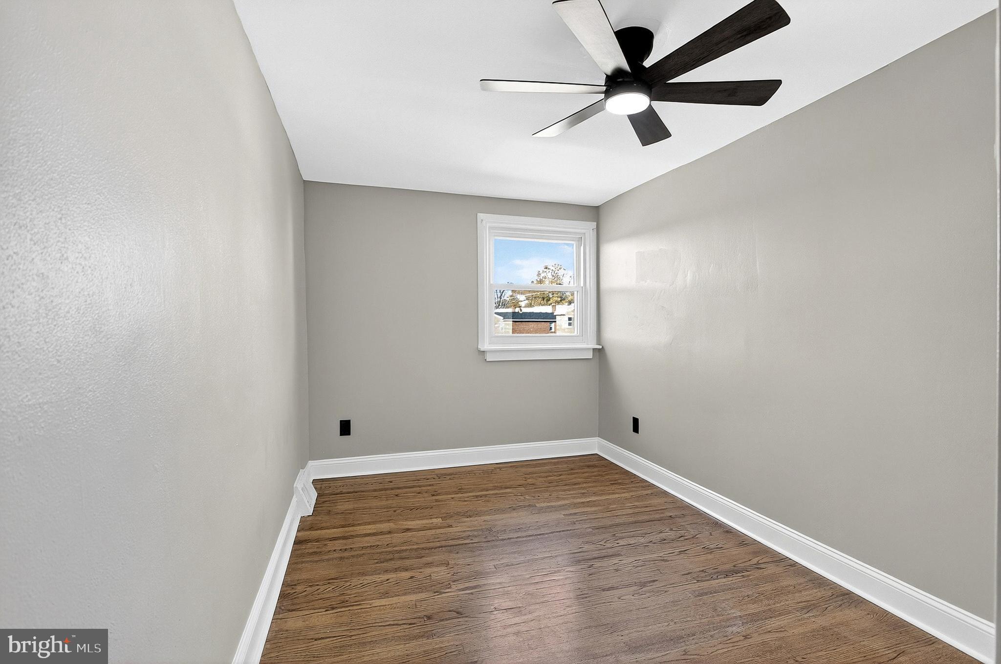 3901 Elson Road Brookhaven, PA 19015 - Photo 28 of 47 wooden floor in an empty room with a window