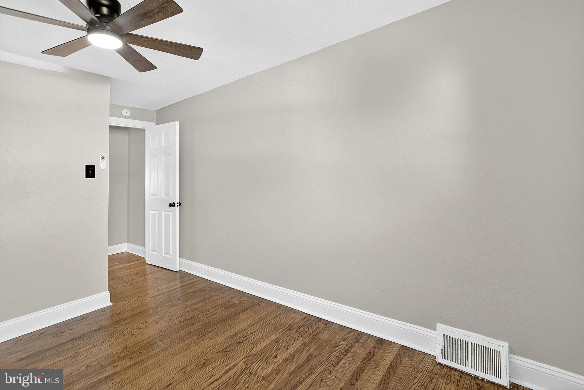 3901 Elson Road Brookhaven, PA 19015 - Photo 29 of 47 a view of an empty room with wooden floor