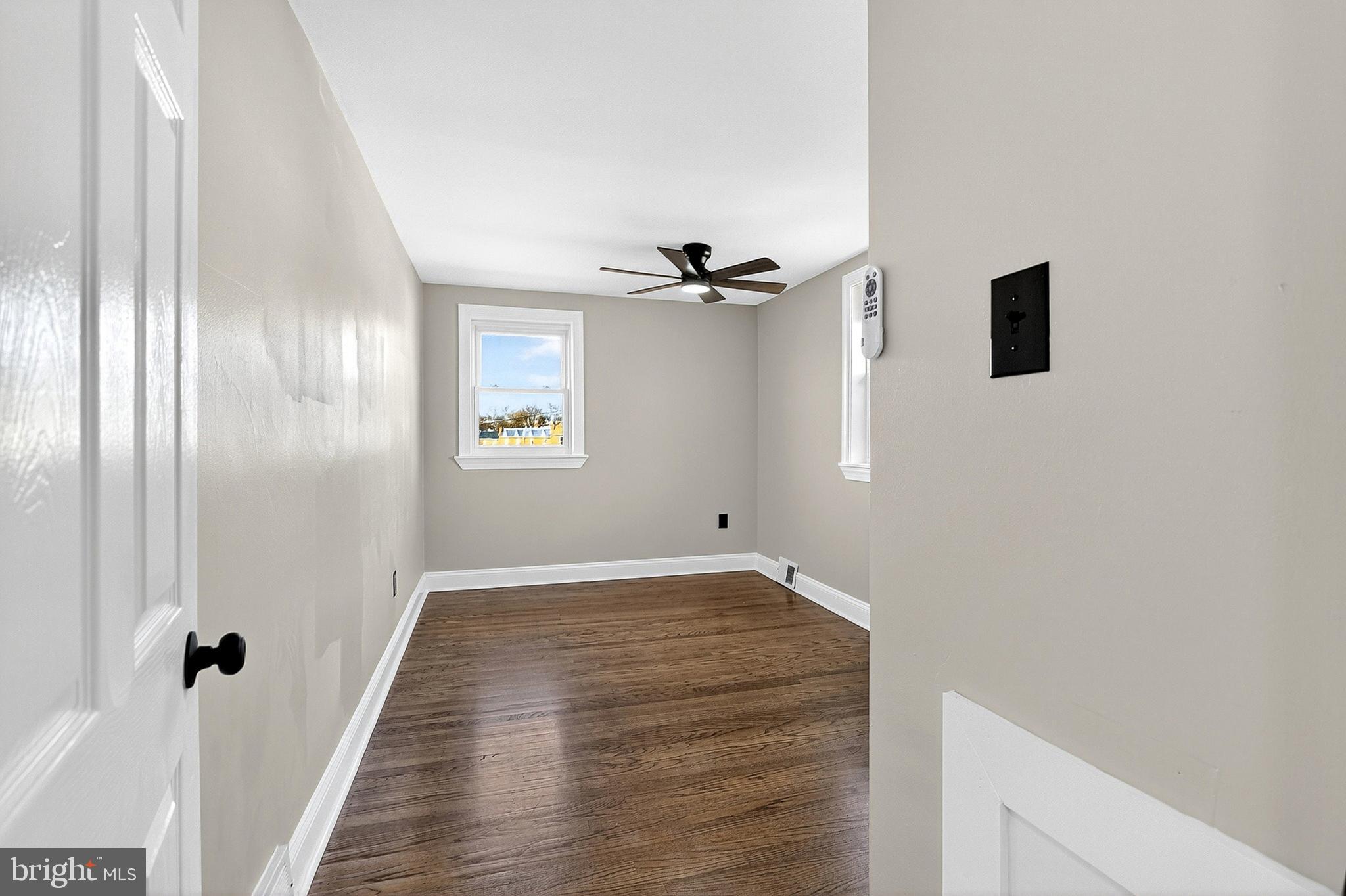 3901 Elson Road Brookhaven, PA 19015 - Photo 30 of 47 a view of a hallway with wooden floor and staircase