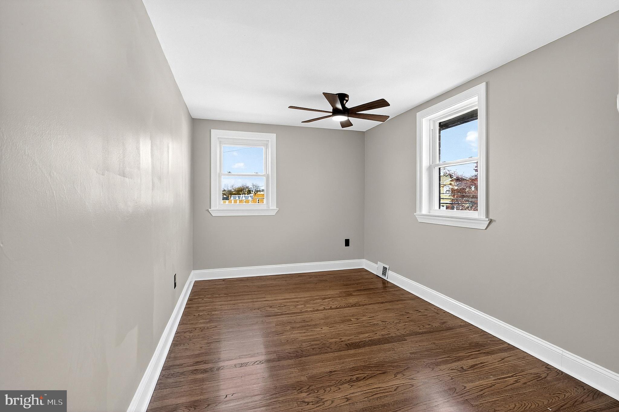 3901 Elson Road Brookhaven, PA 19015 - Photo 31 of 47 a view of empty room with wooden floor and fan