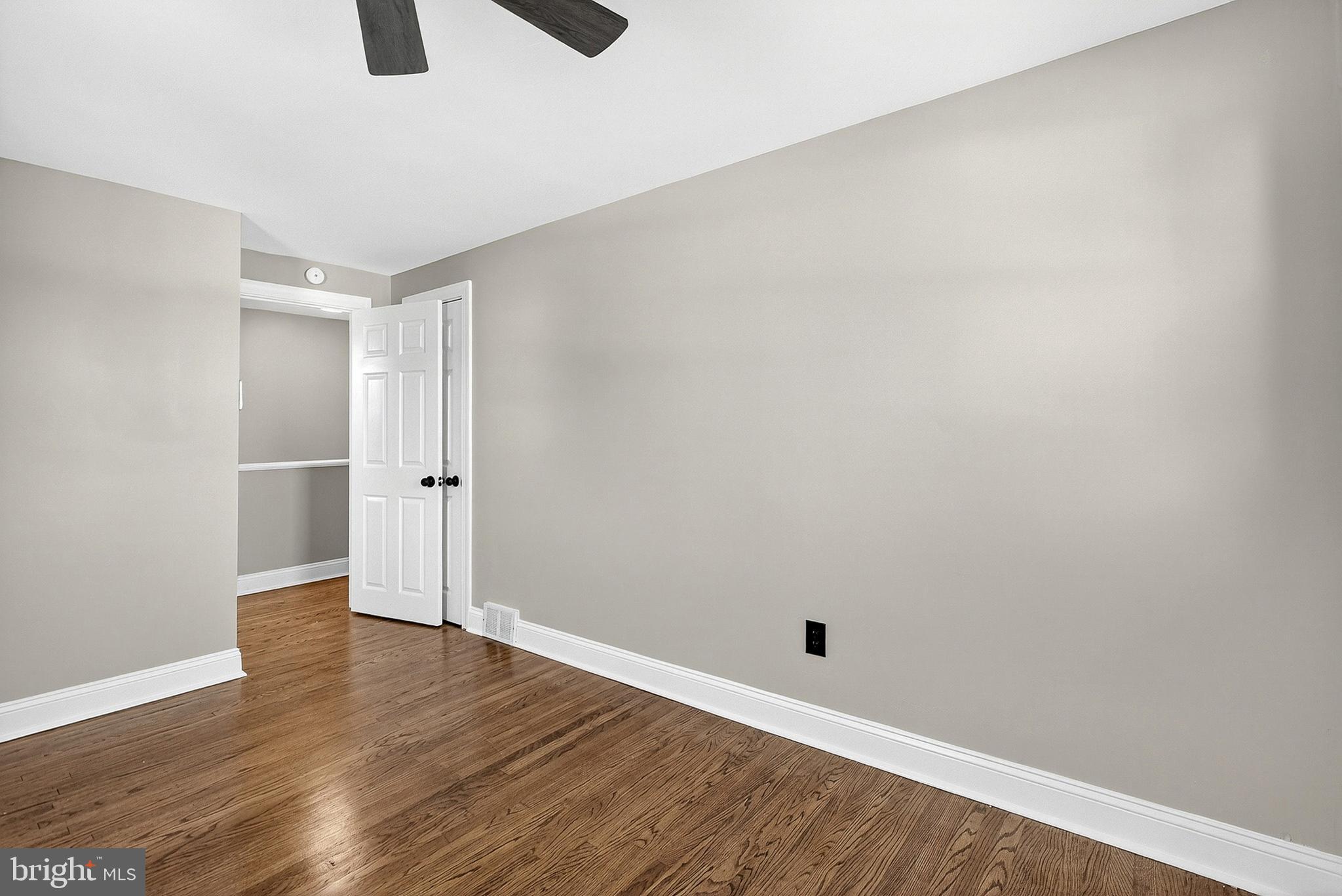 3901 Elson Road Brookhaven, PA 19015 - Photo 32 of 47 a view of an empty room with wooden floor
