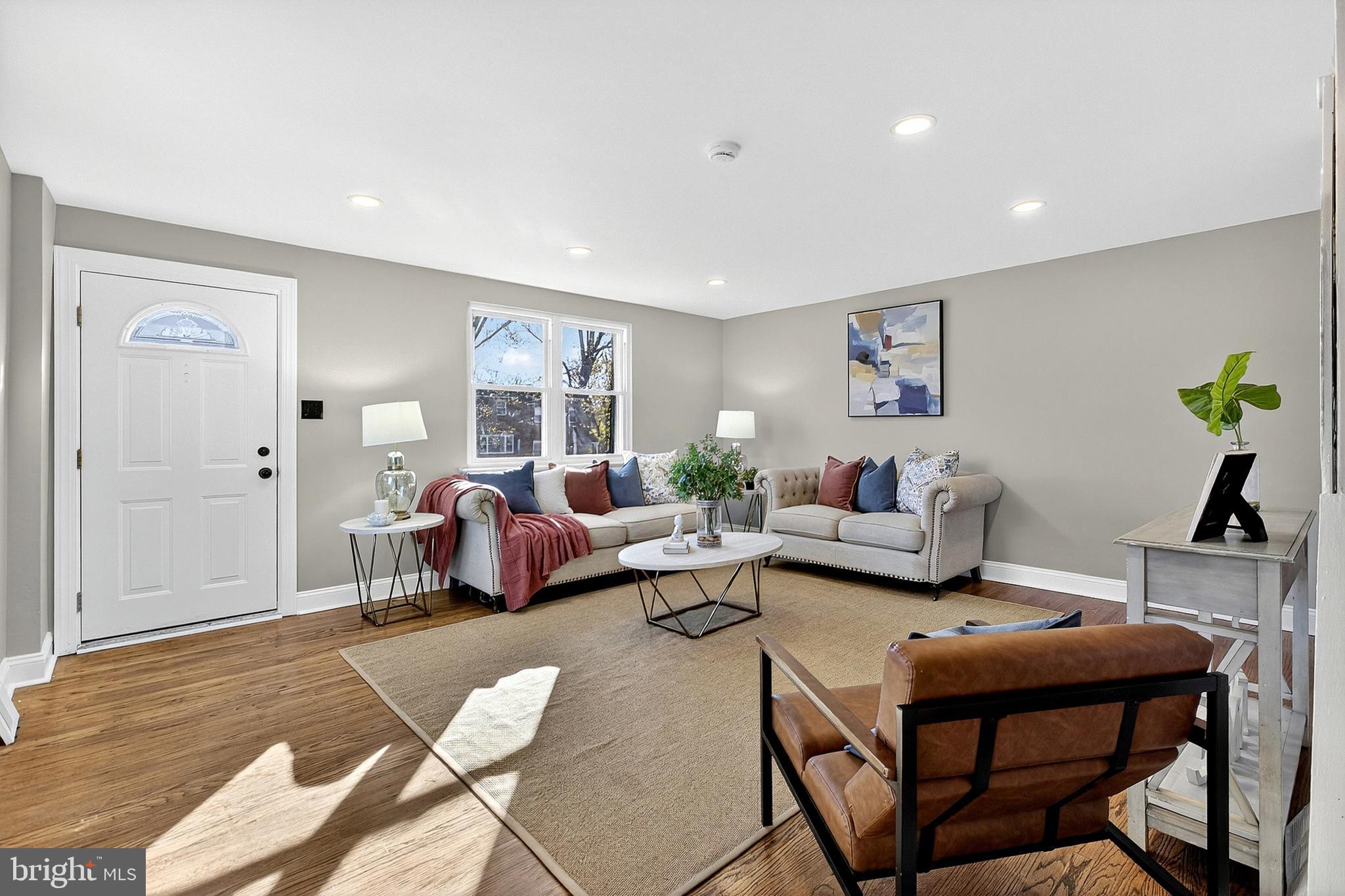 3901 Elson Road Brookhaven, PA 19015 - Photo 9 of 47 a living room with furniture and wooden floor
