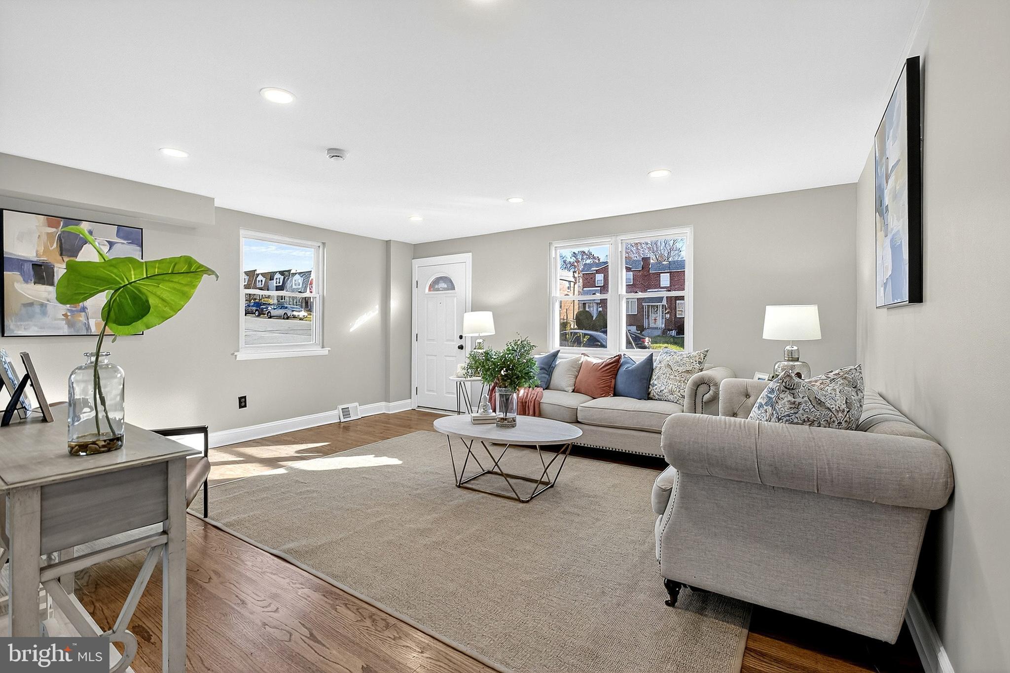 3901 Elson Road Brookhaven, PA 19015 - Photo 10 of 47 a living room with furniture and a potted plant