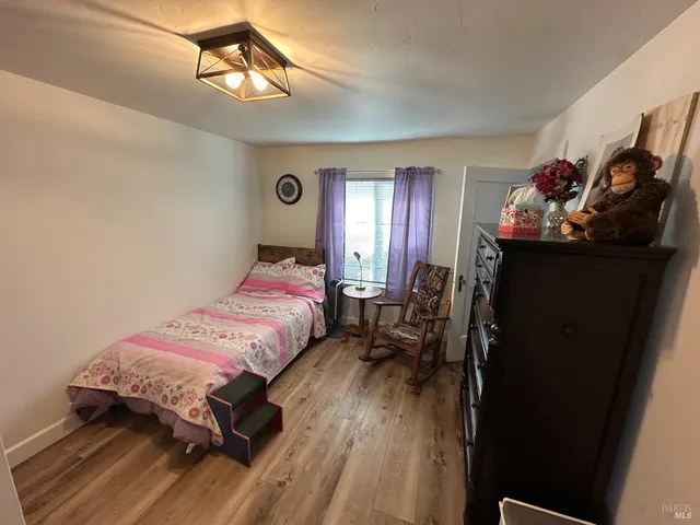 a view of a hallway to a house