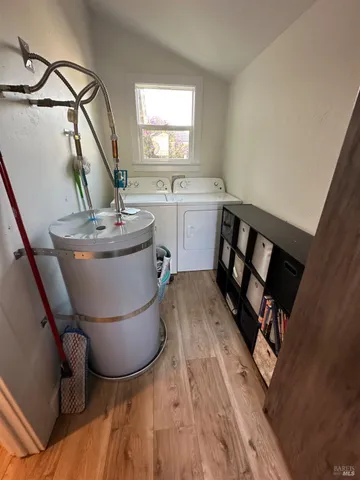 a view of a balcony with wooden floor