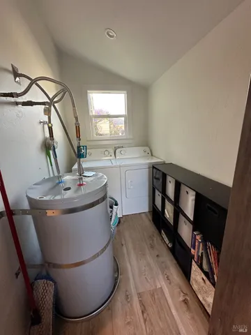 a view of a house with wooden floor and a sink