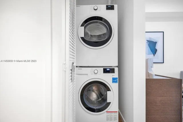 a utility room with dryer and washer