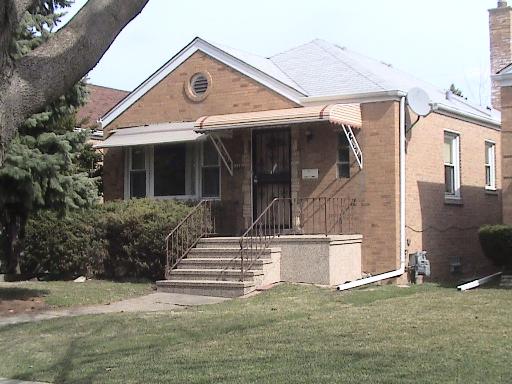 2227 Northgate Avenue North Riverside, IL 60546 - Photo 1 of 1 a front view of a house with garage