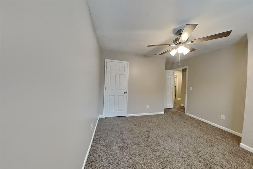 5105 North Bridges Drive Alpharetta, GA 30022 - Photo 12 of 21 wooden floor in an empty room