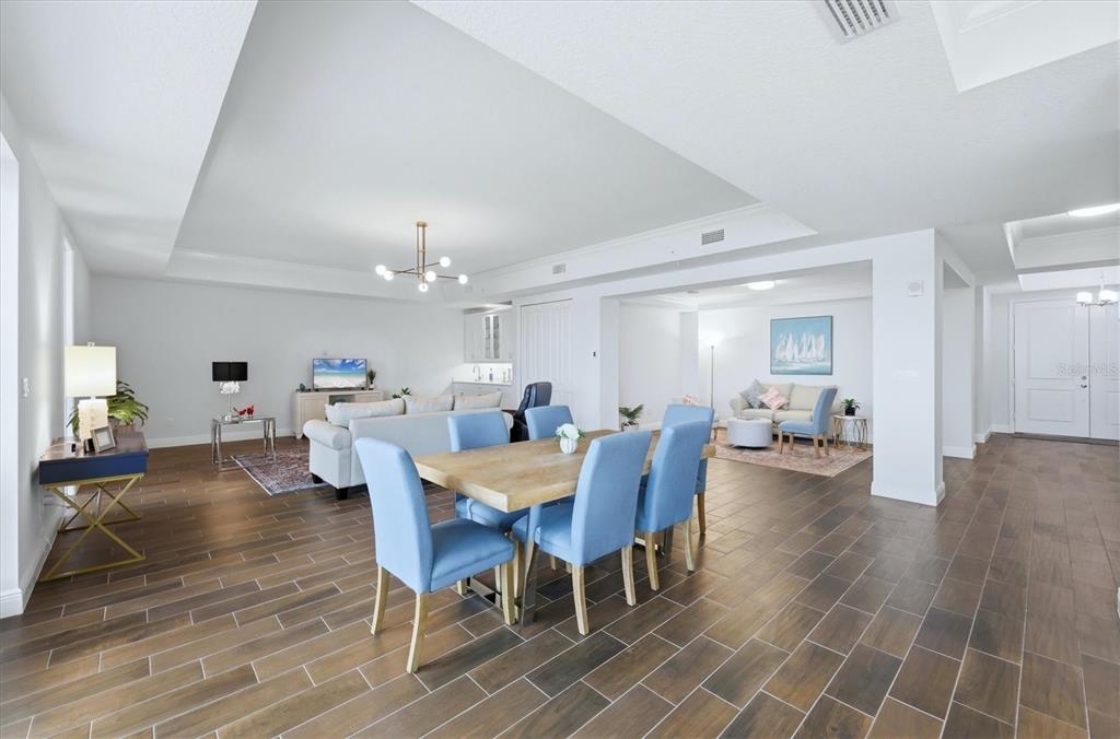 10510 Boardwalk Loop, Unit 602 Lakewood Ranch, FL 34202 - Photo 12 of 77 a view of a dining room with furniture