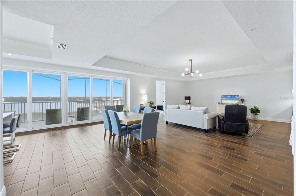 10510 Boardwalk Loop, Unit 602 Lakewood Ranch, FL 34202 - Photo 14 of 77 a living room with furniture and a table