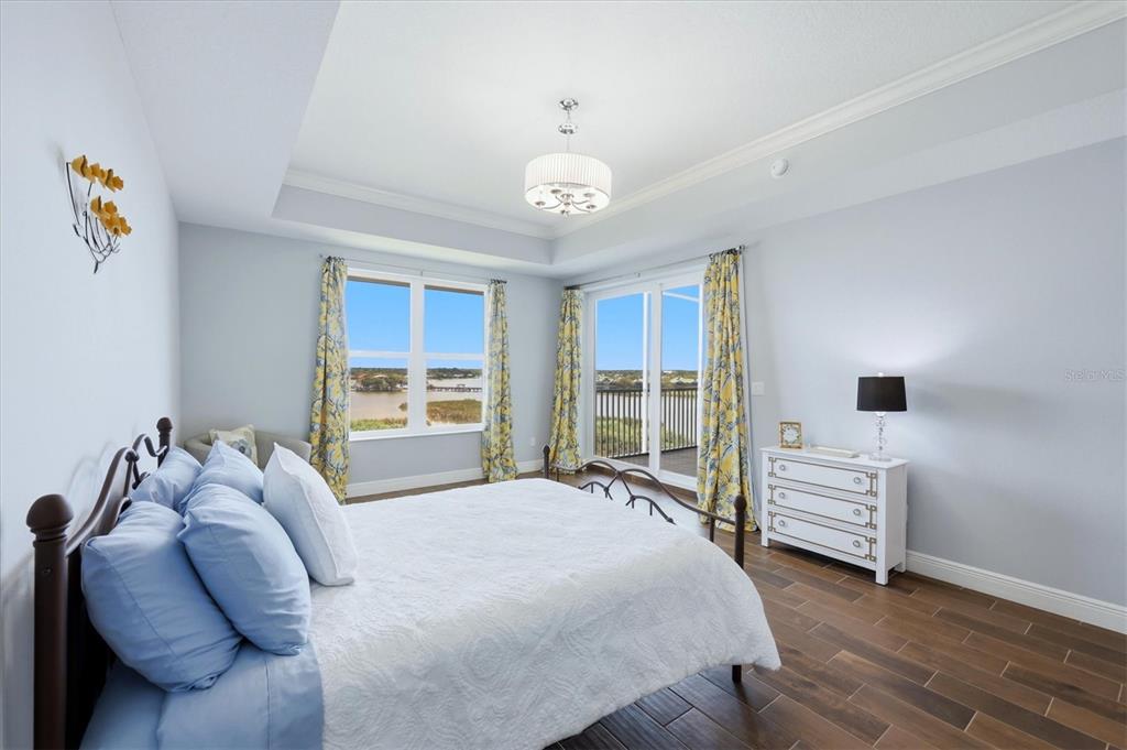 10510 Boardwalk Loop, Unit 602 Lakewood Ranch, FL 34202 - Photo 29 of 77 a bedroom with a bed and a window