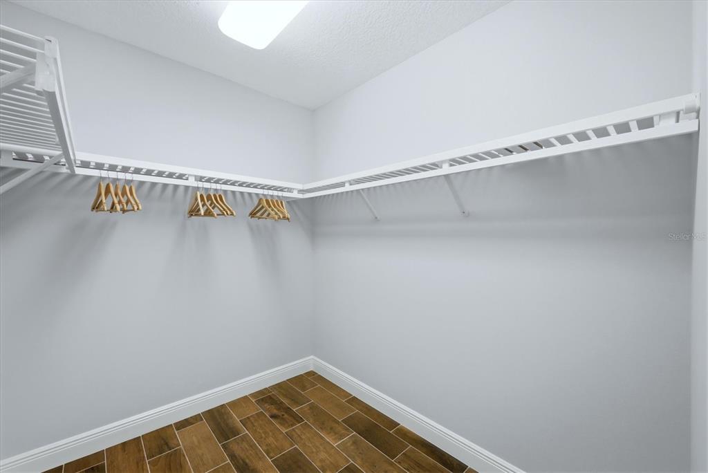 10510 Boardwalk Loop, Unit 602 Lakewood Ranch, FL 34202 - Photo 30 of 77 a view of a room with racks on the wall
