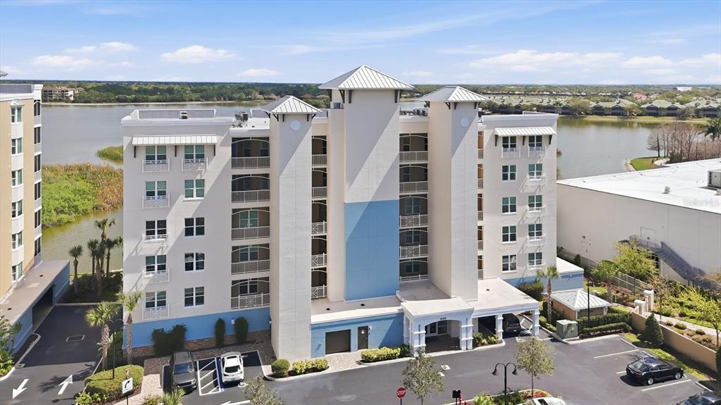 10510 Boardwalk Loop, Unit 602 Lakewood Ranch, FL 34202 - Photo 6 of 77 a front view of a building with outdoor space and ocean view