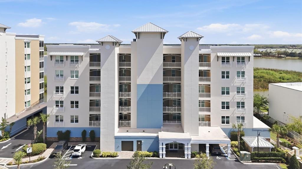 10510 Boardwalk Loop, Unit 602 Lakewood Ranch, FL 34202 - Photo 66 of 77 front view of a building with a street