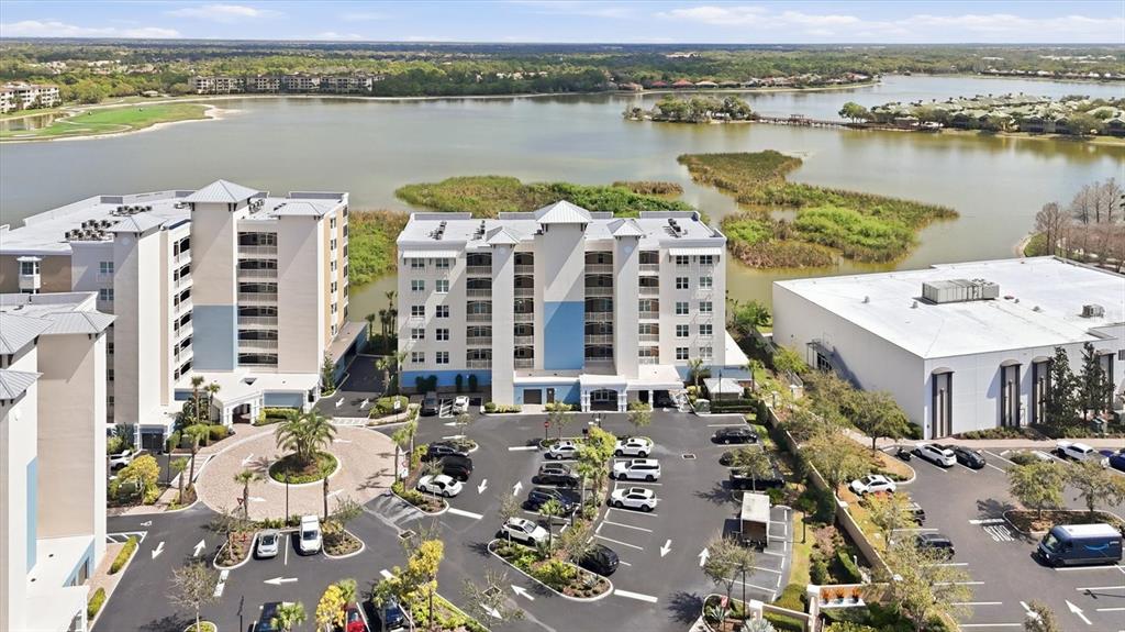 10510 Boardwalk Loop, Unit 602 Lakewood Ranch, FL 34202 - Photo 68 of 77 a picture of city view with lake view and mountain view