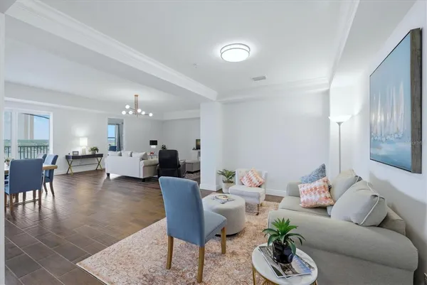 a living room with furniture and a table