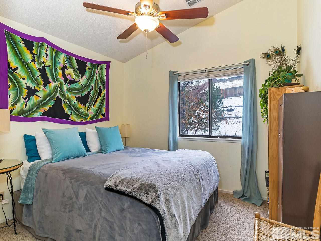 1703 Terrace Heights Lane Reno, NV 89523 - Photo 12 of 13 a bedroom with a bed and a window