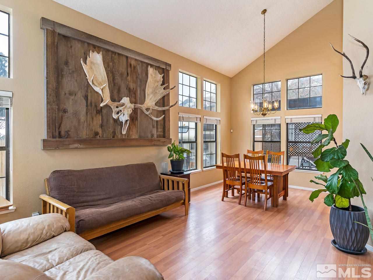 1703 Terrace Heights Lane Reno, NV 89523 - Photo 2 of 13 a living room with furniture and wooden floor
