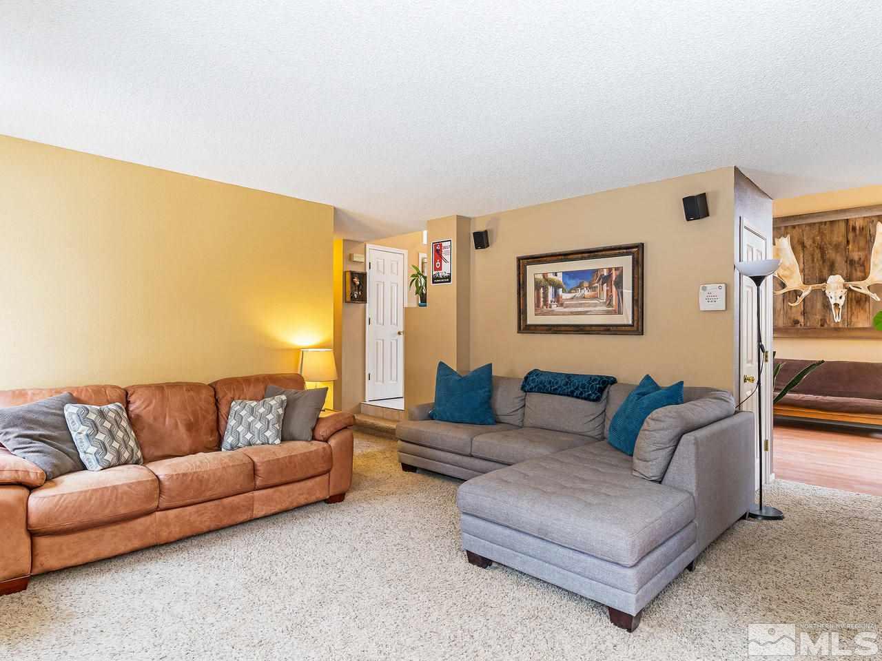 1703 Terrace Heights Lane Reno, NV 89523 - Photo 4 of 13 a living room with furniture and a couch