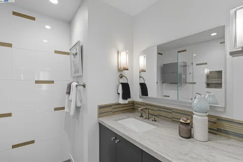 a work room with furniture and a window