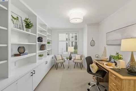 a view of a terrace with sitting area