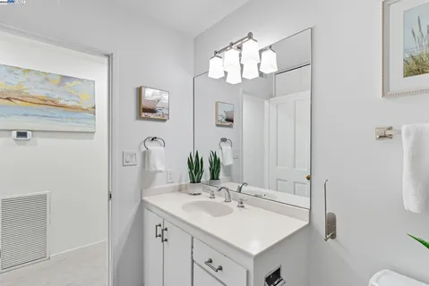 a view of city from balcony having outdoor seating