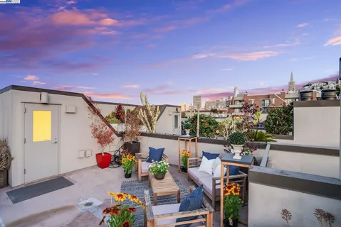 a view of city with tall buildings