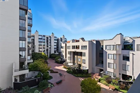a view of a swimming pool with a lounge chair