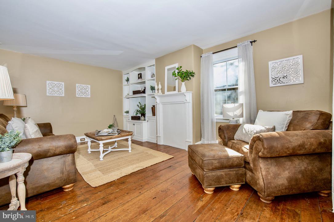 295 Balligomingo Road Conshohocken, PA 19428 - Photo 2 of 27 Living Room with original wide plank wood floors