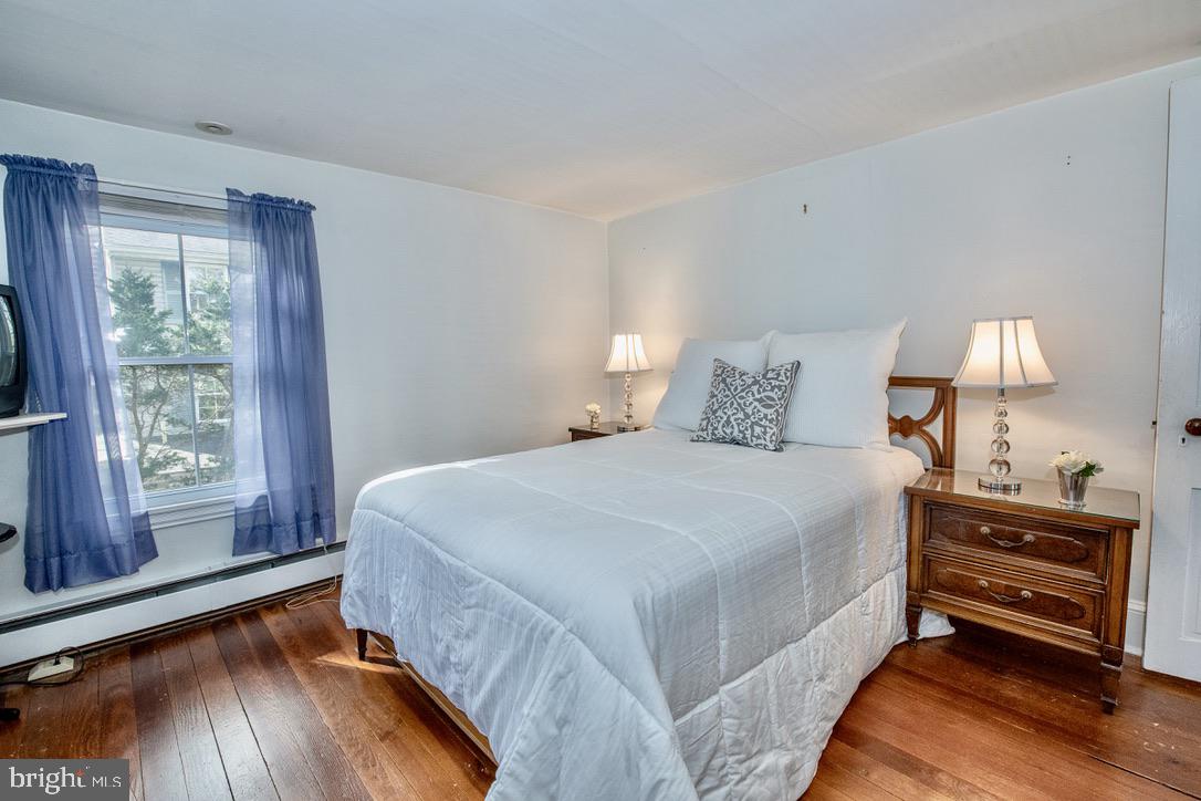 295 Balligomingo Road Conshohocken, PA 19428 - Photo 12 of 27 Main Bedroom with gleaming old wood floors