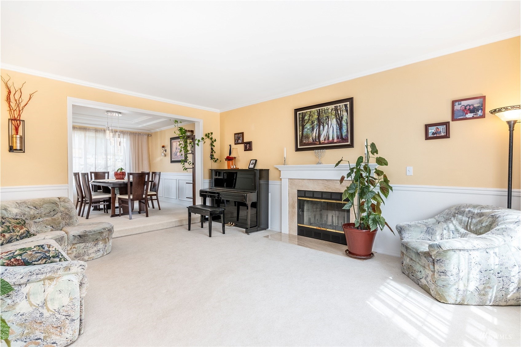 1807 Field Avenue Northeast Renton, WA 98059 - Photo 11 of 38 a living room with furniture a fireplace and a flat screen tv