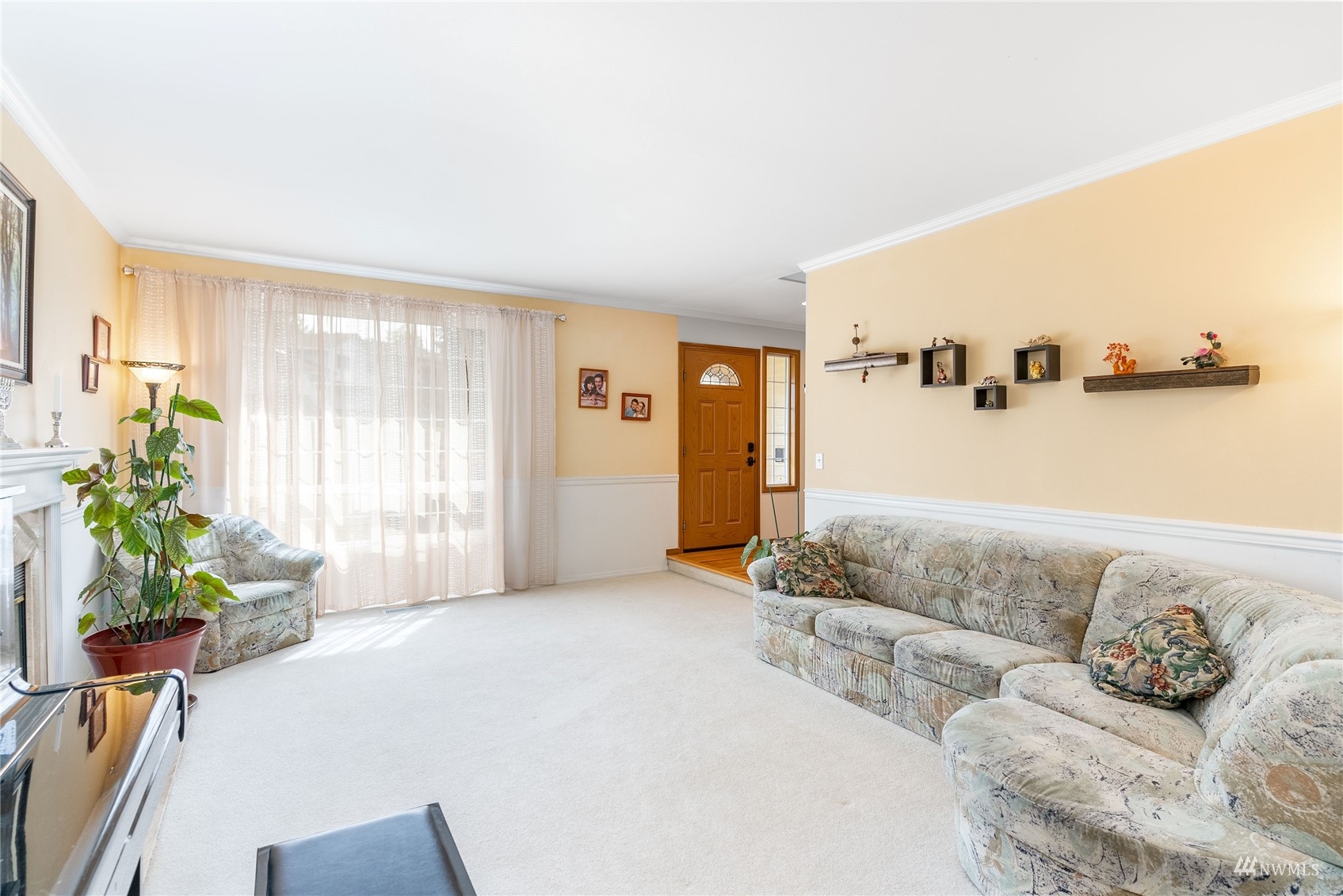 1807 Field Avenue Northeast Renton, WA 98059 - Photo 12 of 38 a living room with furniture and a large window