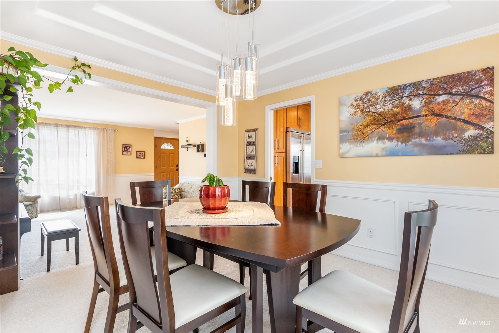 1807 Field Avenue Northeast Renton, WA 98059 - Photo 13 of 38 a view of a dining room with furniture window and wooden floor