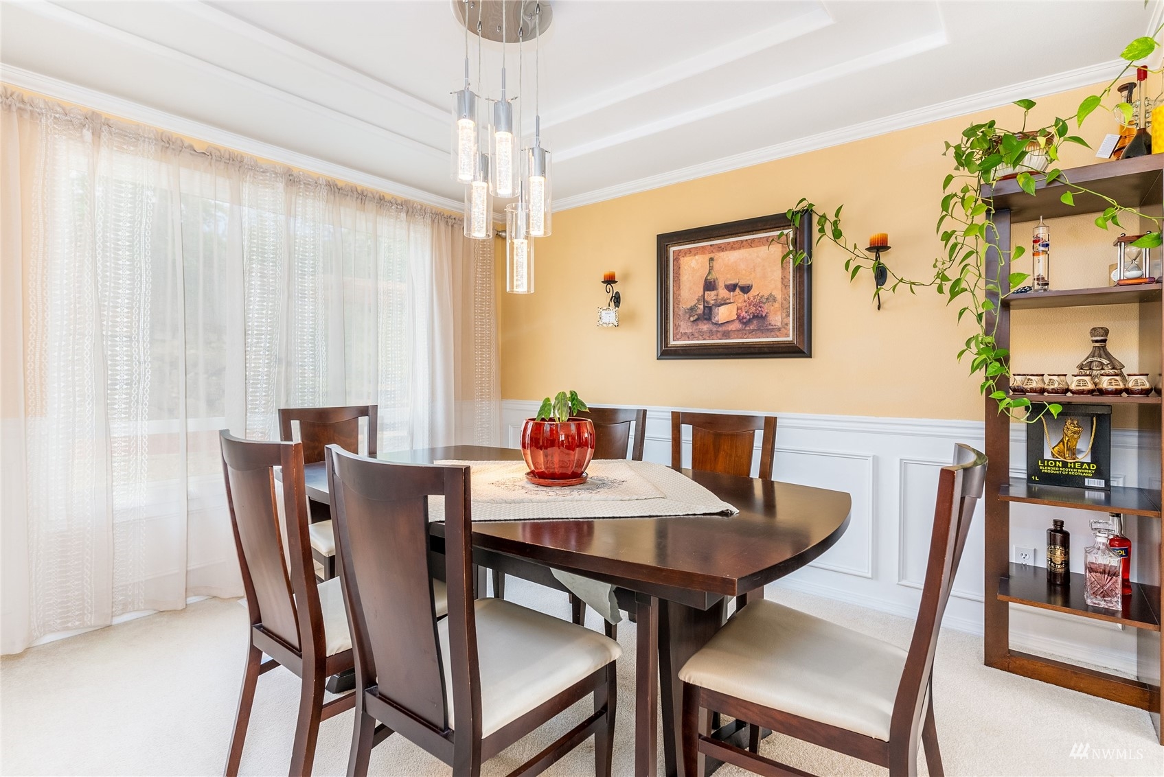 1807 Field Avenue Northeast Renton, WA 98059 - Photo 14 of 38 a view of a dining room with furniture window and wooden floor