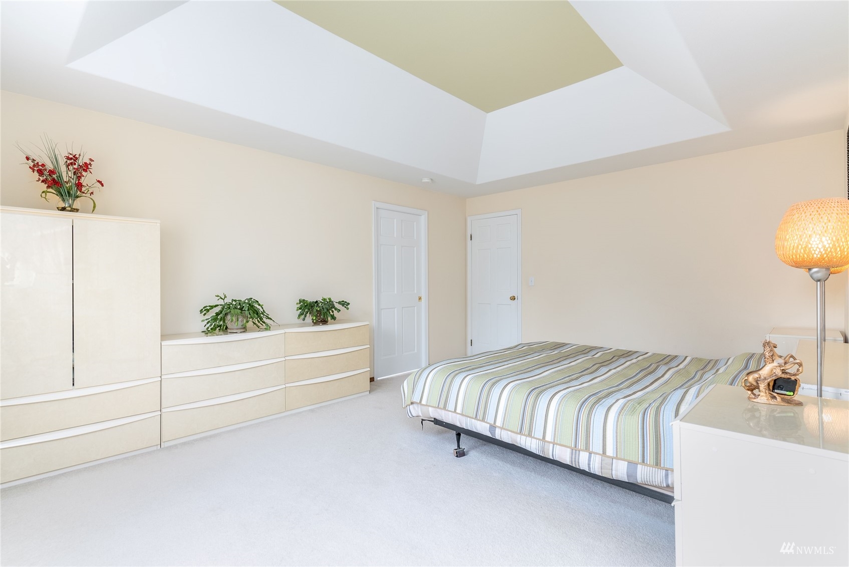 1807 Field Avenue Northeast Renton, WA 98059 - Photo 28 of 38 a bedroom with a bed and a night stand