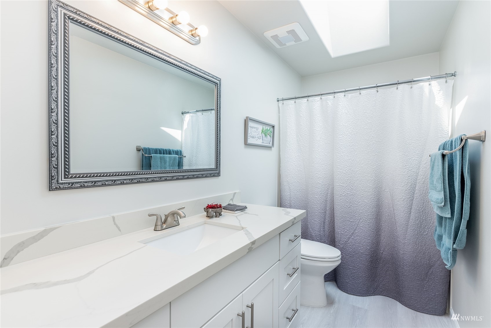 1807 Field Avenue Northeast Renton, WA 98059 - Photo 33 of 38 a bathroom with a sink toilet and shower