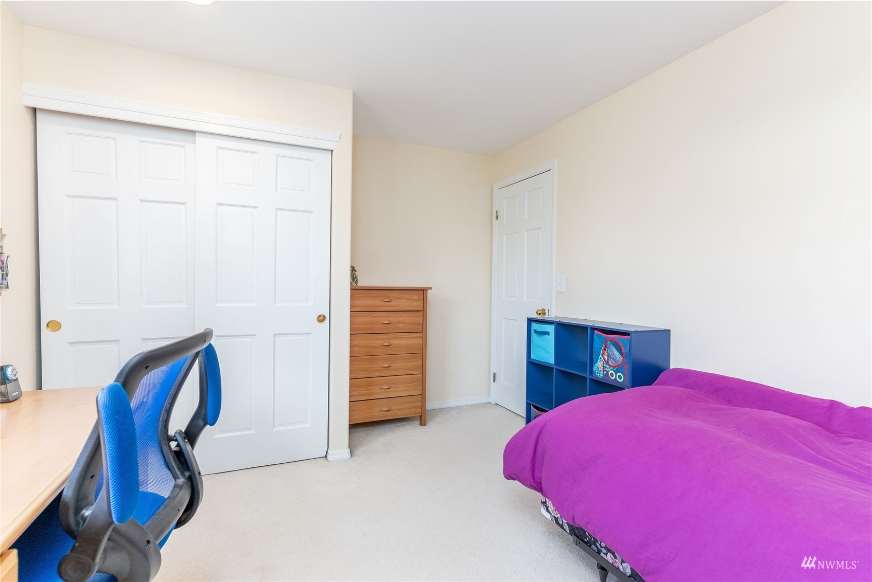 1807 Field Avenue Northeast Renton, WA 98059 - Photo 35 of 38 a bedroom with a bed and a closet