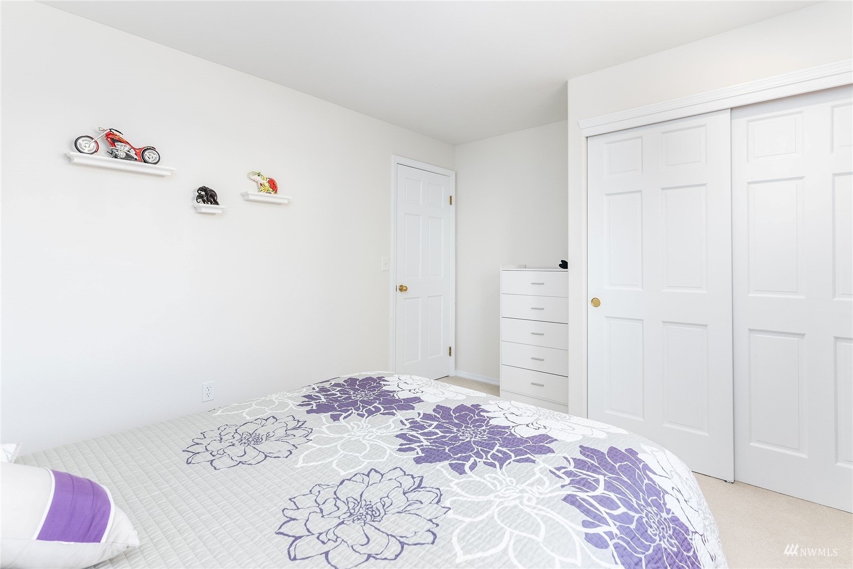 1807 Field Avenue Northeast Renton, WA 98059 - Photo 37 of 38 a bedroom with a bed and a dresser