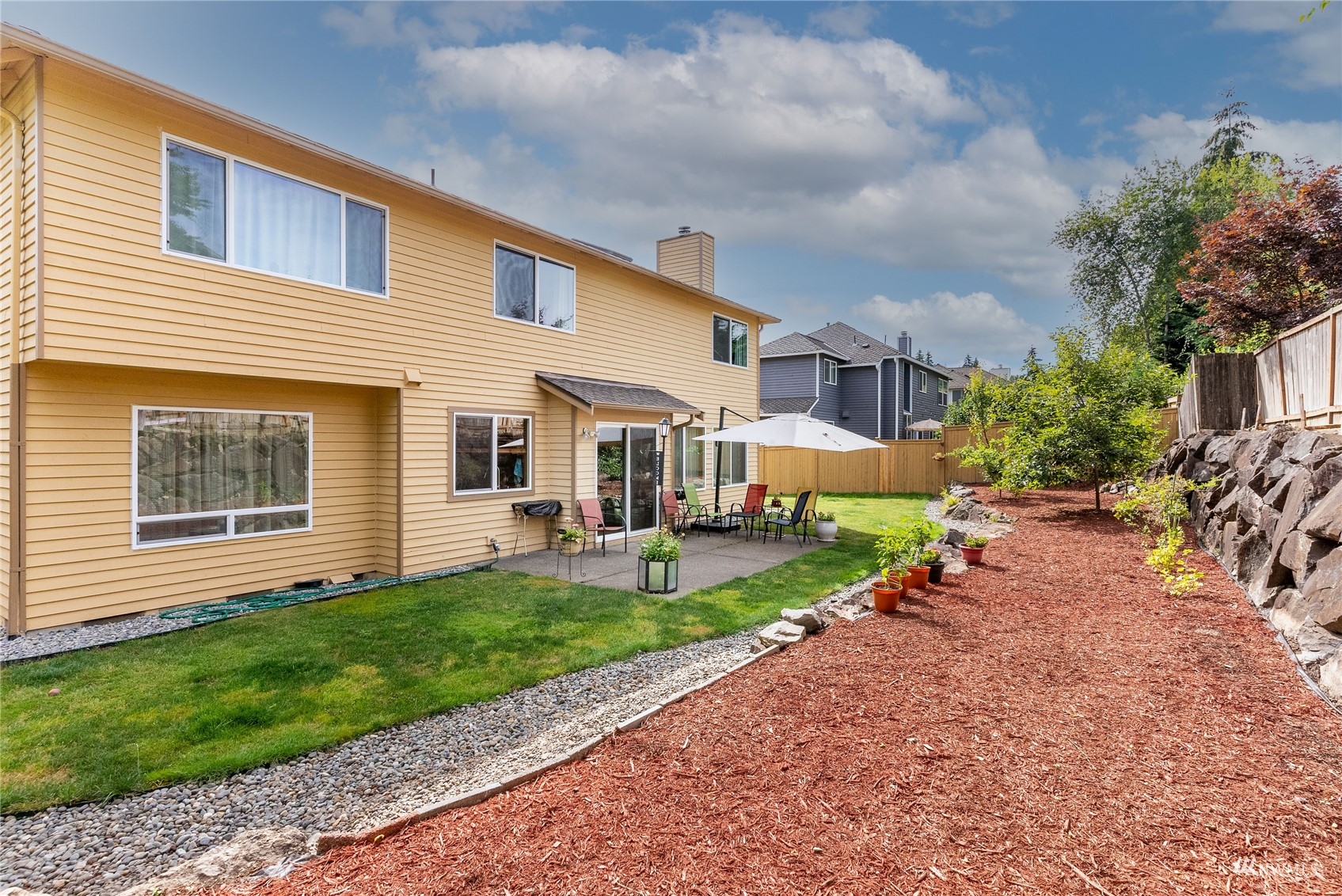 1807 Field Avenue Northeast Renton, WA 98059 - Photo 6 of 38 a front view of house with yard and green space
