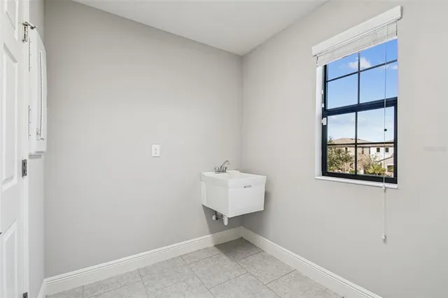 a bathroom with a sink a vanity and a mirror